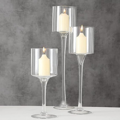 מעמד זכוכית לנר סט מושלם של 3 מחזיקי נרות שקופים מעוצבים ב-3 גבהים שונים ליצירת לוק א-סימטרי רומנטי ונעים בעיניים